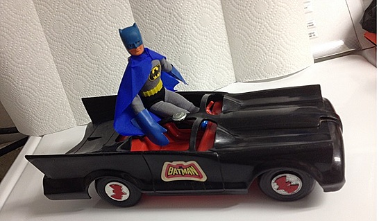 Batman enjoying his ride with new cape, mitts ,belt, boots and chest emblem