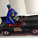 Batman enjoying his ride with new cape, mitts ,belt, boots and chest emblem